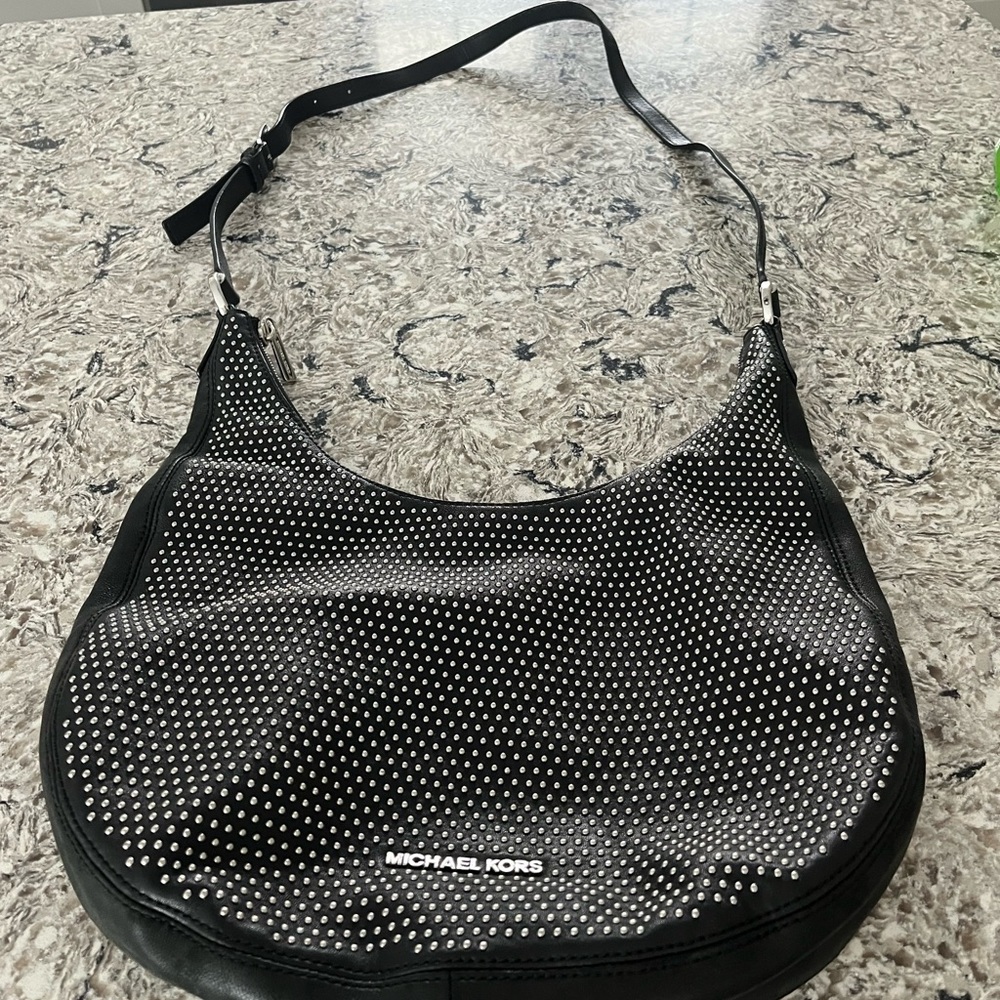 MICHAEL Michael Kores all leather with silver inlaid beads. Gently used.
